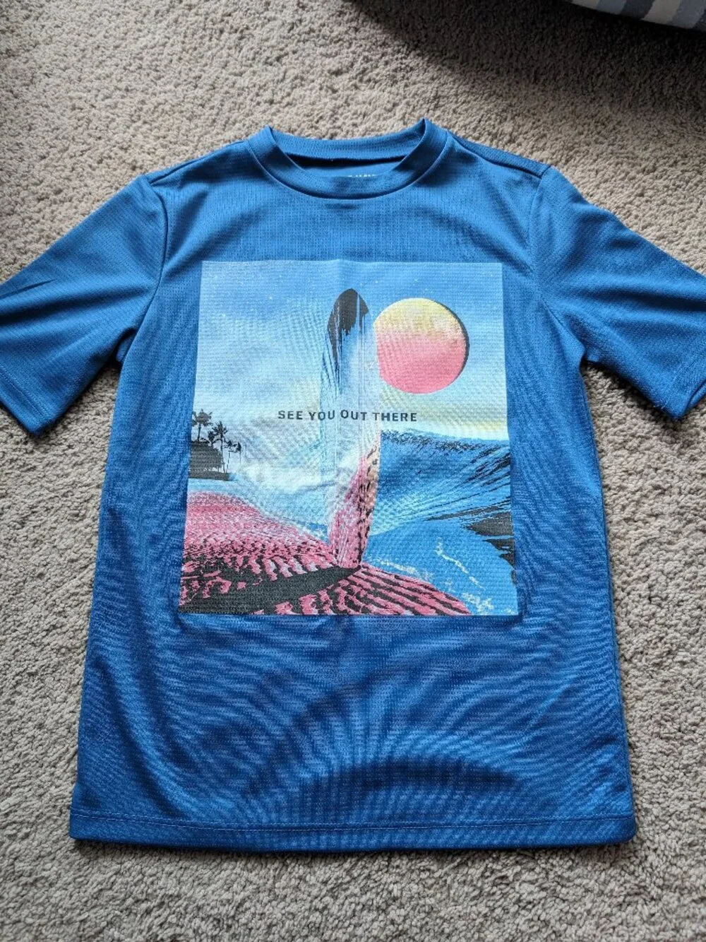 ON blue rashguard/swim top (YM)